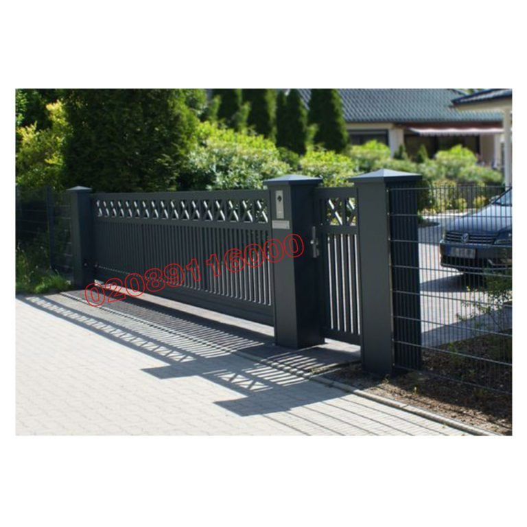 Anthracite metal sliding driveway gate with diamond lattice top on brick pillar track