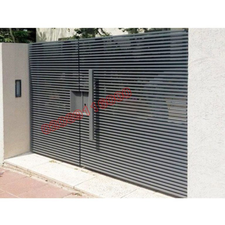 Anthracite 3/4 split driveway gate with horizontal slats and pillar mailbox on white rendered wall