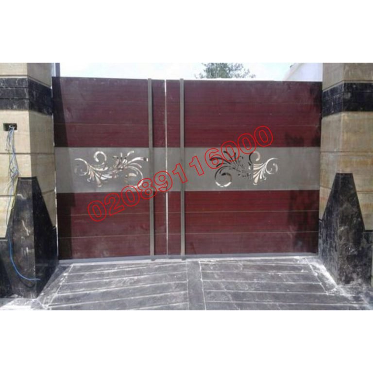 3/4 split driveway gate in burgundy with silver laser-cut floral panel between stone pillars