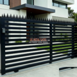 Black Horizontal Louvered Sliding Gate with Spike Top