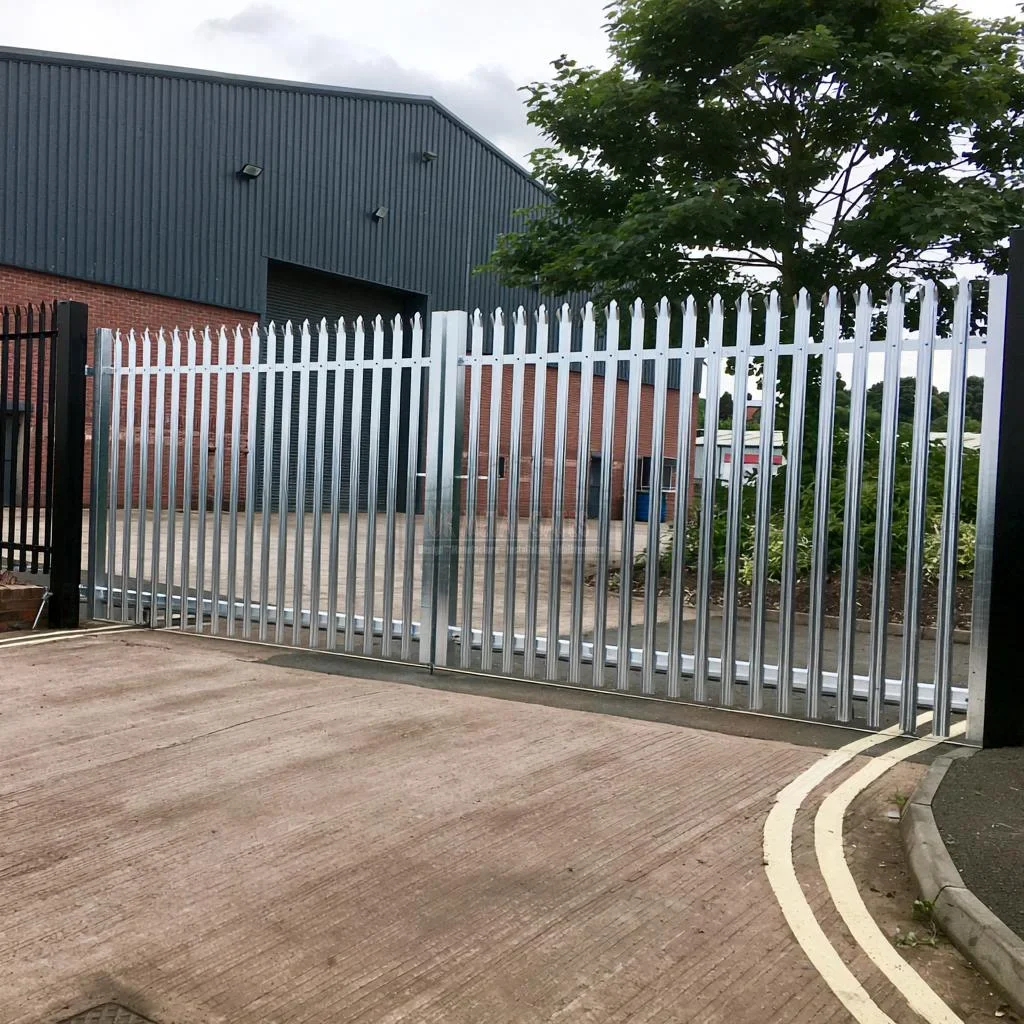 Home 78 Wide silver palisade double gates viewed at an angle across an industrial entrance.